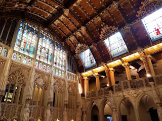 Photo of stained glass windows inside De Haar castle.